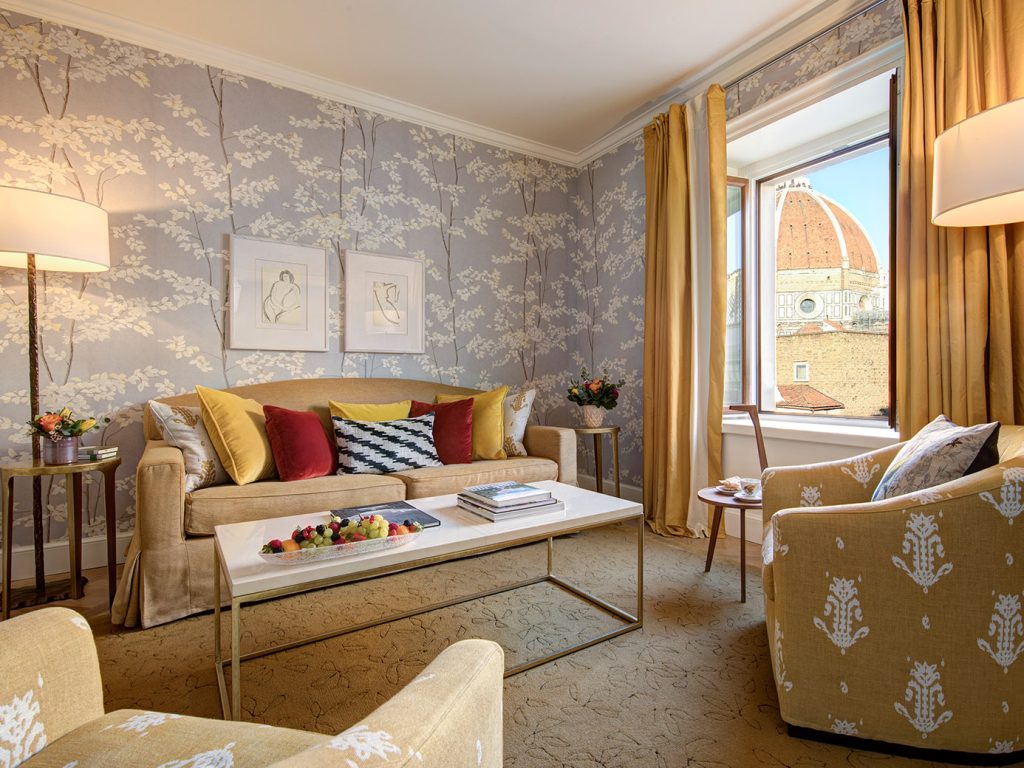 20 unforgettable stays - Hotel Savoy room with couch, coffee table and seats