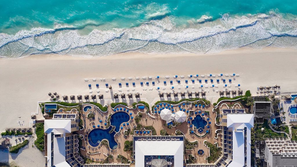 Best All-Inclusive Luxury Resorts - Aerial view of Kempinski Hotel Cancún's beachfront pools