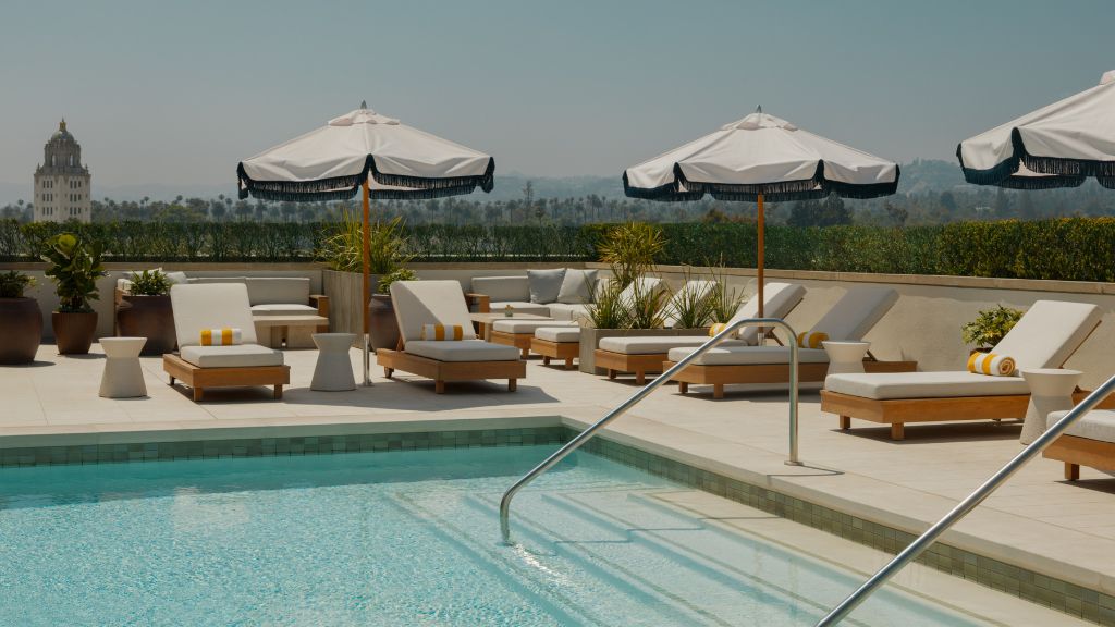 hotels with rooftop pools - L'Ermitage Beverly Hills, California - view of hills from refreshed rooftop pool area