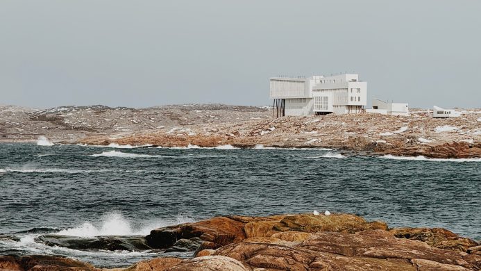 Fogo Island Inn by Christine Flynn | the main hotel building on a rocky shore