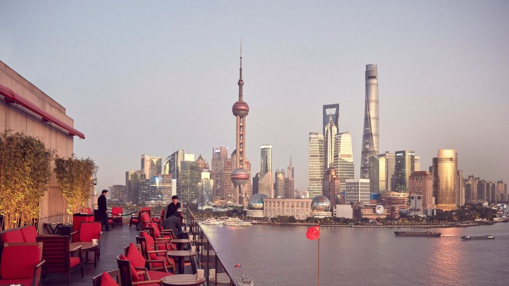 Sunset drinks at Sir Elly’s Terrace at The Peninsula Shanghai | Shanghai, China | a bar with views of the city skyline