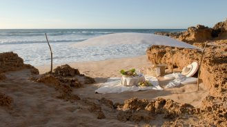 Picnic spots - La Sultana Oualidia - Oualidia, Morocco - picnic table, blanket and shade set up on the beach