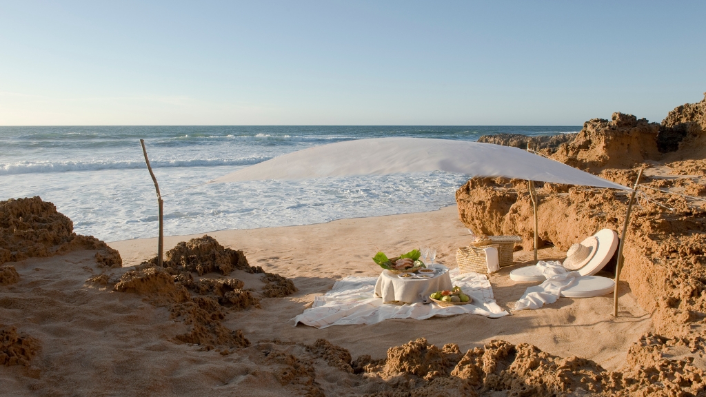 Picnic spots - La Sultana Oualidia - Oualidia, Morocco - picnic table, blanket and shade set up on the beach