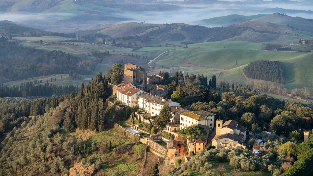 Educational vacations - Castelfalfi - Montaione, Italy - aerial shot of the hotel surrounded by greenery