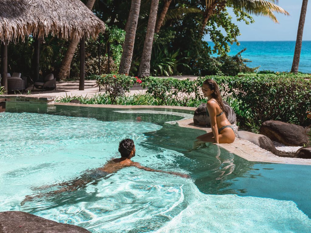 COMO Laucala Island Travel Diary by Jyo Shankar - couple lounging at their villa's private pool