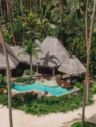 COMO Laucala Island Travel Diary by Jyo Shankar - aerial view of couple at their villa