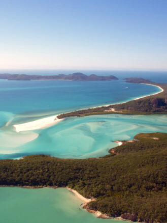Best Places to Travel in 2026 featuring Queensland, Australia | an aerial view of Whitehaven Beach in the Whitsunday Islands