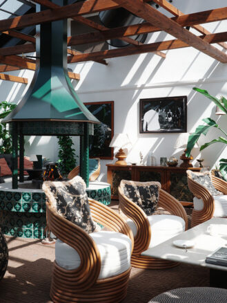 Copenhagen to Berlin Travel Diary | Rox Resort pool club lounge area with fireplace
