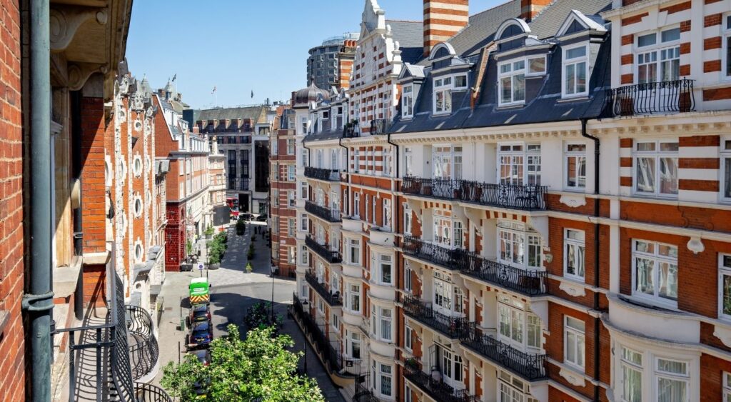 Luxury hotels in London - Knightsbridge - The Capital Hotel, Apartments & Townhouse - Aerial view of the hotel's red and white exterior and street