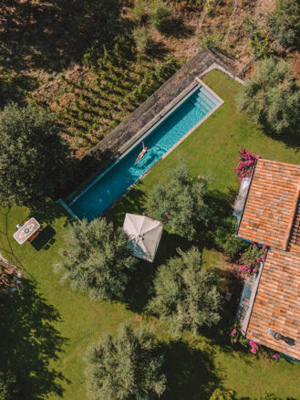Where to stay in Sicily travel diary - private villa infinity pool at Monaci delle Terre Nere Etna Wine Resort viewed from above